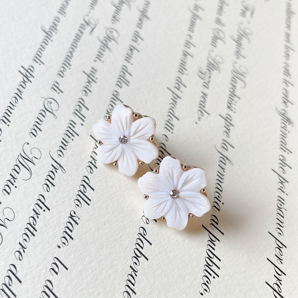 White floral earrings